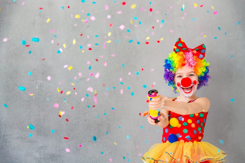 bang-funny-kid-clown-playing-at-home-child-shooting-party-popper-confetti-1-april-fool-s-day-concept (1)